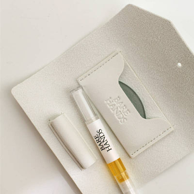 Bare Hands skincare product set on a textured white surface