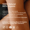 Product packaging with text about natural and organic ingredients on a close-up of skin.