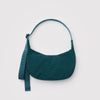 A small dark teal nylon crescent crossbody bag against a white background.