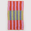 Colorful striped towel with red, pink, green, and blue stripes on a white background