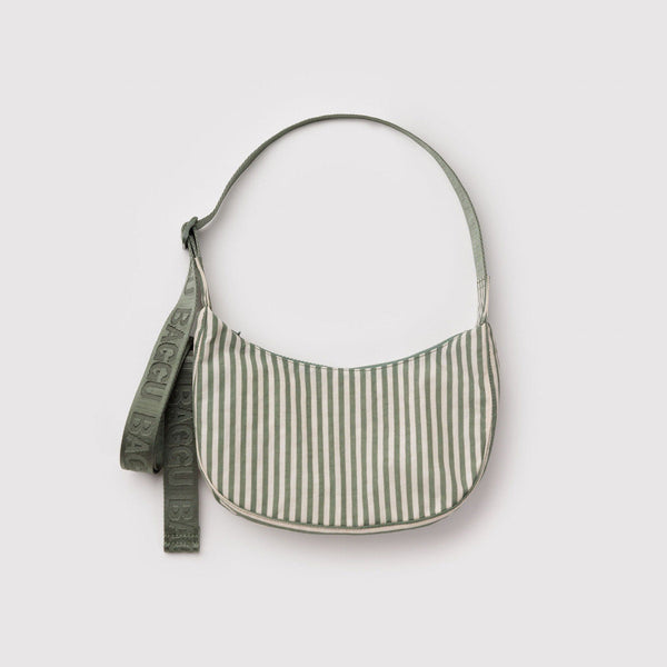 A green and white striped crescent-shaped nylon handbag on a light grey background.