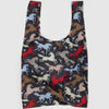 A nylon shopping bag in dark navy with colorful silhouettes of horses and white flowers against a white backdrop.