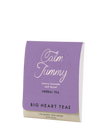 Purple package of Big Heart Teas Calm Tummy herbal tea on a white background