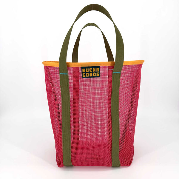 Red mesh tote bag with green handles and a visible brand label on a white background