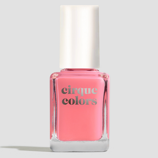 Pink nail polish bottle with 'cirque colors' branding on a light gray background