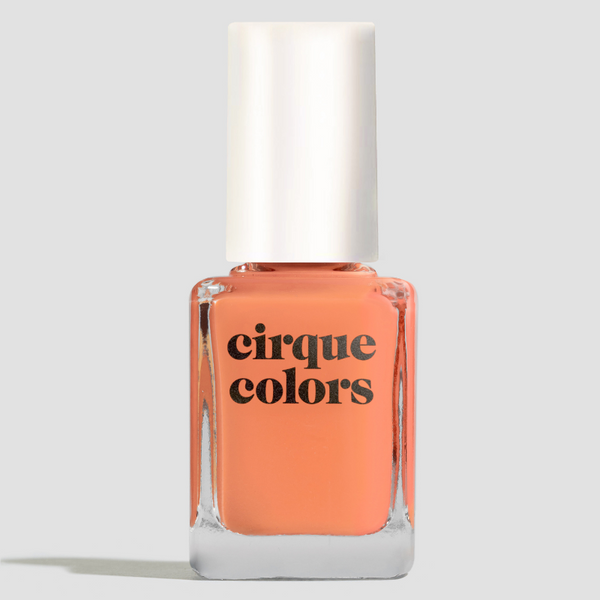 Cirque Colors nail polish bottle on a light gray background