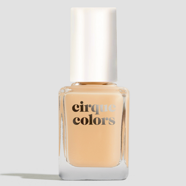 Cirque Colors nail polish bottle on a light gray background