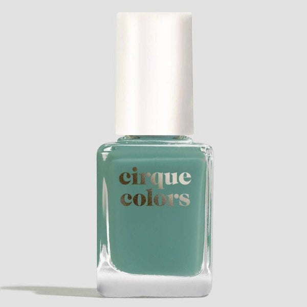 Cirque Colors nail polish bottle on a light gray background