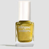 Gold nail polish bottle with 'cirque colors' branding on a light gray background