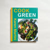 'Cook Green' by Karen Martini cookbook on neutral background.