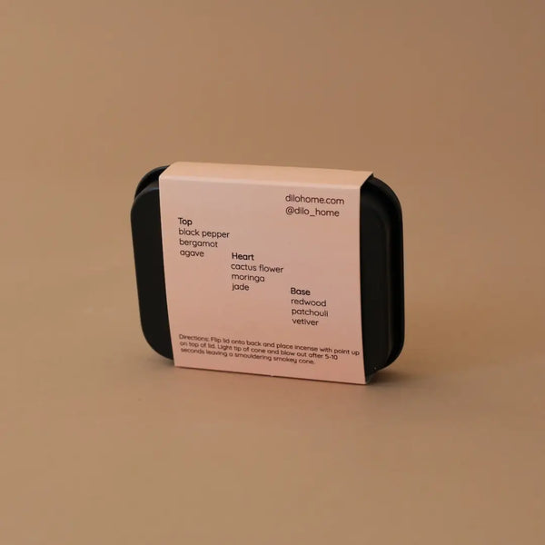 Rectangular container with a label on a beige background