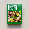 A bright green cookbook called 'Epic Veg' by Jessica Prescott with a colorful photo of a salad, soup, and entree. The book sits against a neutral backdrop.