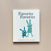 An illustrated children's book called 'Favorite Favorite' with a white cover and an adult and kid bunny pair eating ice creams, rendered in shades of teal. The book sits against a neutral backdrop.