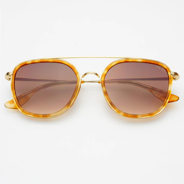 Gold-framed sunglasses with brown lenses on a white background