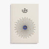 Book titled 'The Life Designer' with a decorative cover on a white background