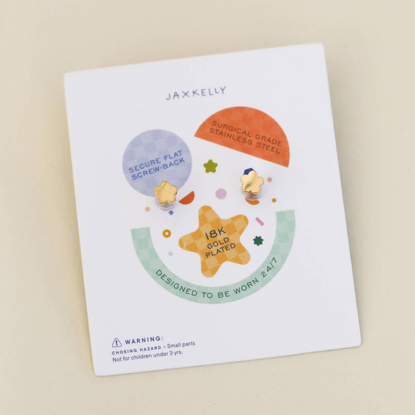 Jaxkelly children's earrings packaging on a beige background
