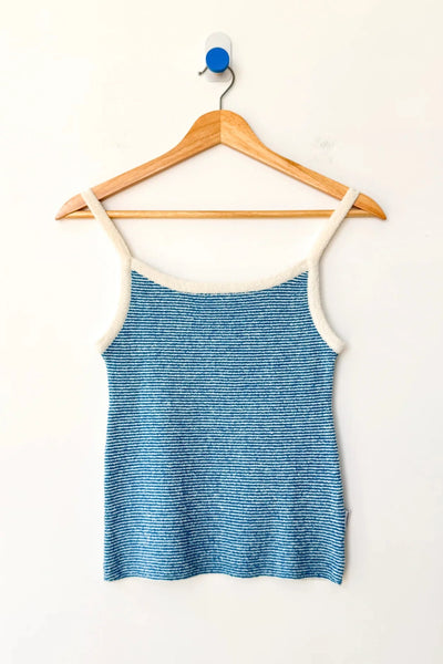 Blue and white striped knit cami on a wood hanger against a white background.