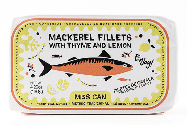 Miss Can Mackerel Fillets with Thyme and Lemon, in a white packaged tin with a colorful illustrated label featuring a mackerel fish, lemon slices, and Portuguese and English text.