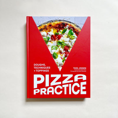 'Pizza Practice' by Tara Jensen cookbook on a neutral background.