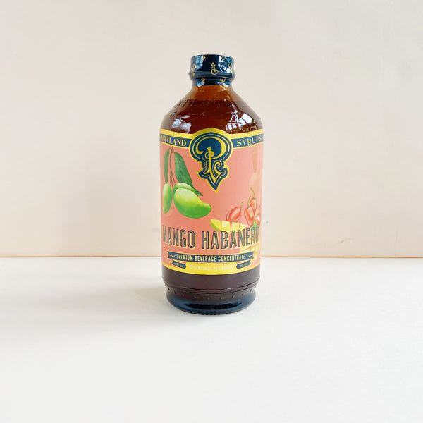 Bottle of Mango Habanero beverage concentrate on a white background