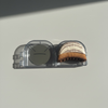 Lymphatic support facial dry brush with a clear case on a light gray background