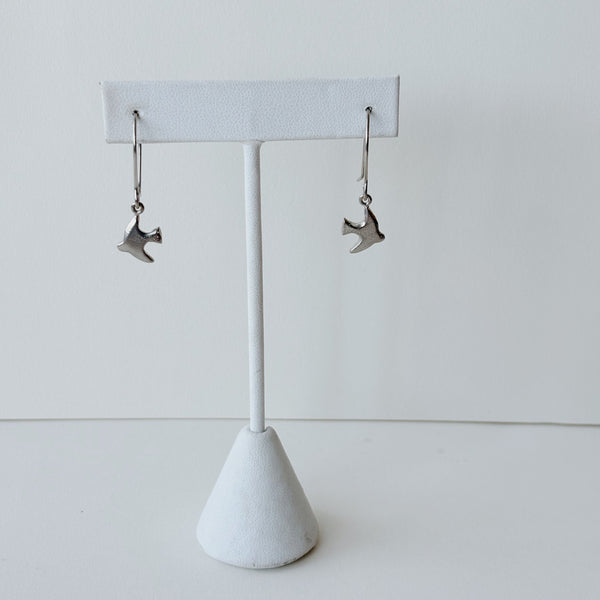 Sterling silver sparrow charm earrings on a white background.
