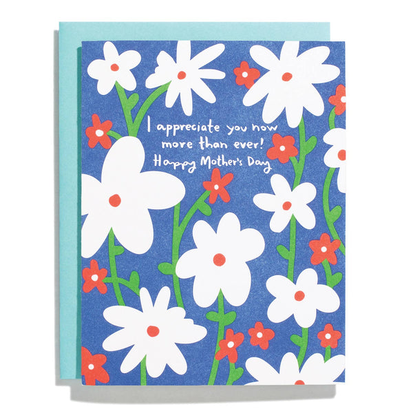 Greeting card with floral design and Mother's Day message on a blue background