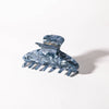 Blue crystal hair clip on a white background