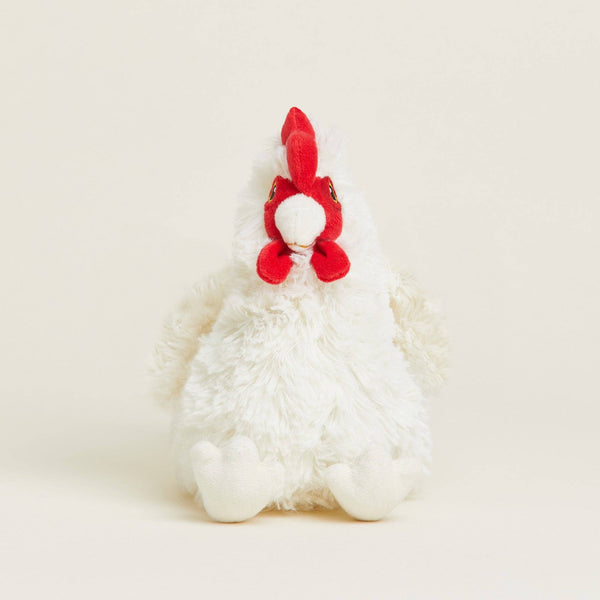 White and red plush chicken toy on white background.