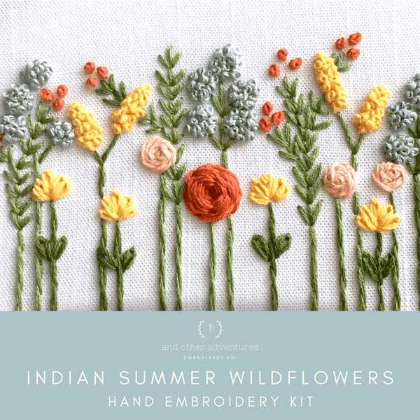 Hand embroidered design of Indian summer wildflowers on a white background with 'and other adventures' branding.