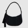 A black nylon crescent crossbody bag against a white background.