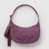 Dusky purple nylon crescent crossbody bag against a white background.