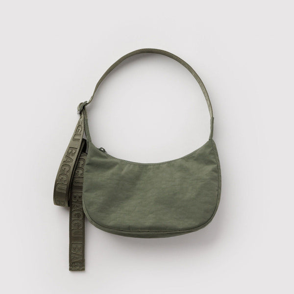 A small olive green nylon crescent crossbody bag against a white background.