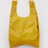 Bright sunflower yellow reusable bag on white background.