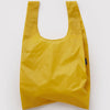 A nylon shopping bag in a bold sunflower yellow against a white backdrop.