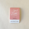 A pink packet of Big Heart Teas, Cup of Love herbal tea, with two tea bags included.