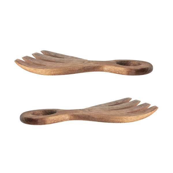 Side view of two wooden salad servers on a white background