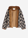An interior view of a beige and grey striped checkerboard fleece jacket with brown corduroy trim and collar against a white background.
