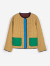 A tan, blue and green colorblock lightweight puffer jacket against a white background.
