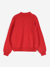 The back of a solid red collared cardigan against a white background.