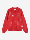 A red polo collar cardigan featuring white forest scene designs against a white background.
