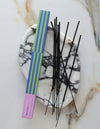 Incense sticks with a box on a marble surface