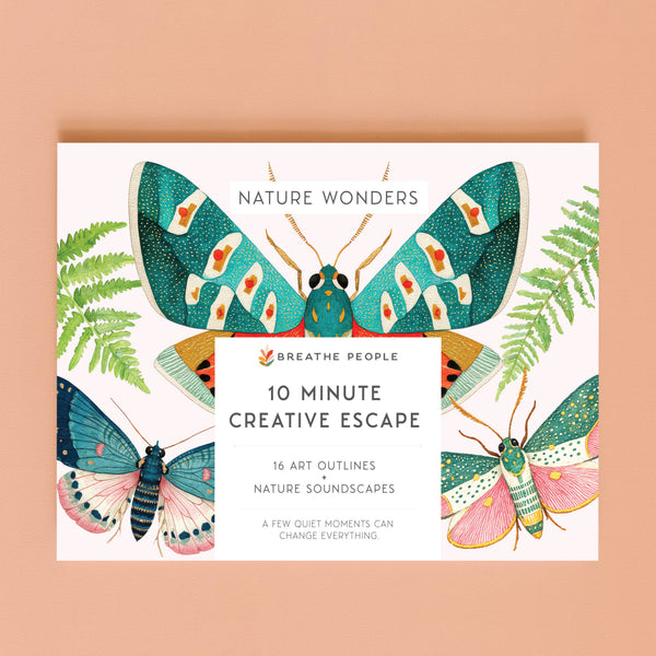 An adult coloring book titled "Nature Wonders" and "Breathe People 10 Minute Creative Escape," shown on a peach background with illustrated butterflies and ferns.