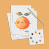 A cute happy orange watercolor postcard with a paintbrush and dot paint palette on an orange background.