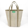 Woven tote bag with multicolored pattern and 'Buena Goods' label on a neutral background