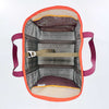 Top down view of a mesh tote bag with orange rim, maroon handles, and an olive security strap on a white background