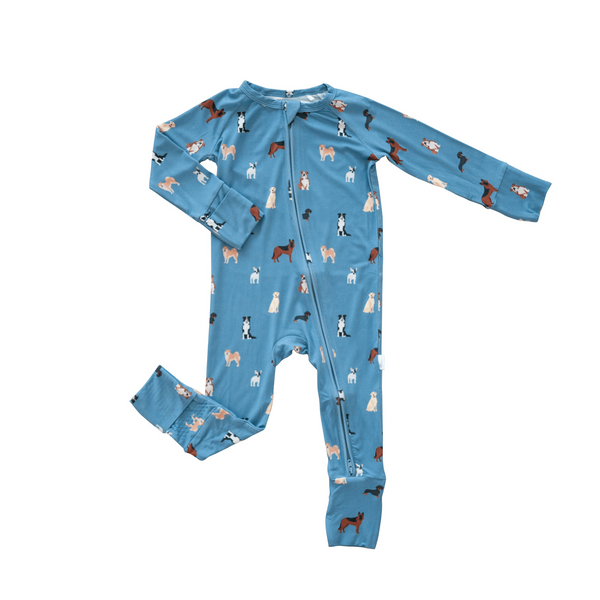 Blue baby onesie with dog pattern on a white background