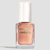 A bottle of cinque colors glitter nail polish in a shimmering peachy rose gold shade, featuring a white cap and gold lettering on a light gray background.