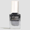A bottle of Cirque Colors glitter thermal nail polish in a shimmering black-silver shade, featuring a white cap and clear glass bottle on a light gray background.