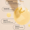 Nail oil with text highlighting ingredients and benefits on a beige background